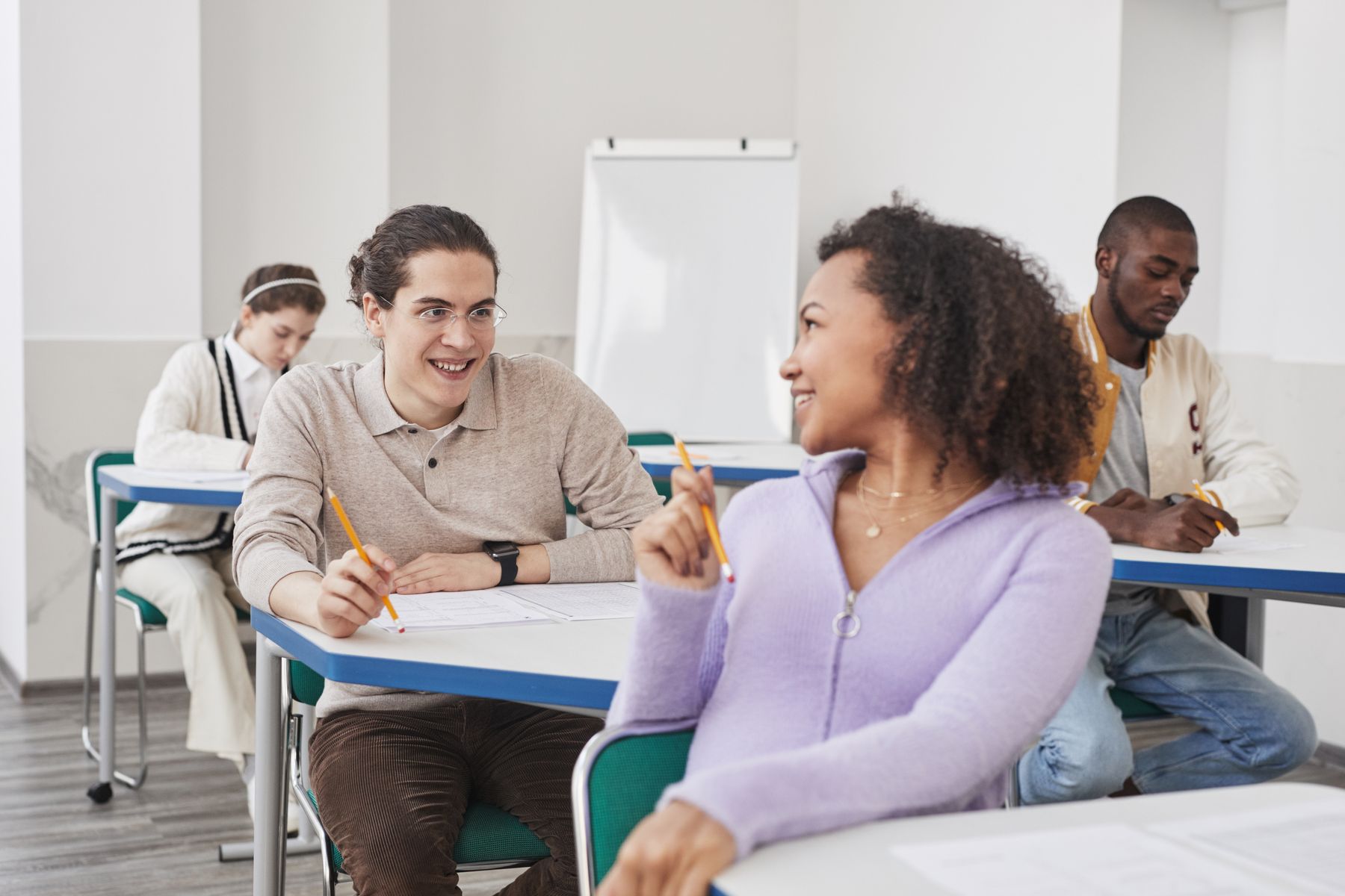 Students taking part in a classroom discussion